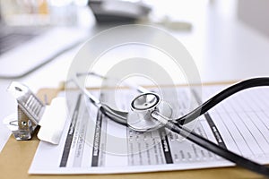 Computer keyboard, mouse and notebook with a pencil on the table