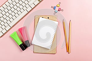 Computer keyboard and note book with pencil