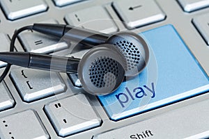 Computer keyboard with play button