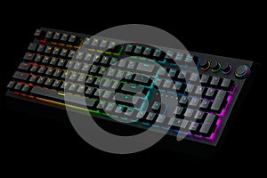 Computer keyboard with rgb colors isolated on black background.