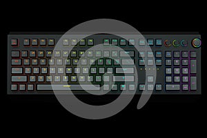 Computer keyboard with rgb colors isolated on black background.