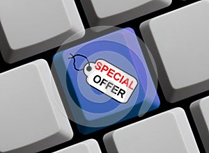Computer keyboard with tag showing Special Offer