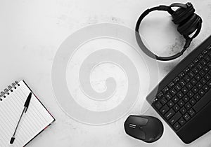 Office workplace desk composition, with computer and notebook.