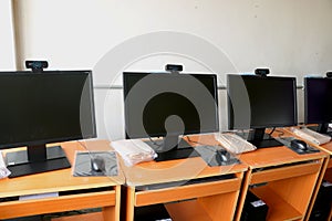 Computer lab at school computers on table