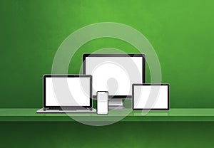 Computer, laptop, mobile phone and digital tablet pc. green shelf banner