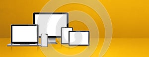 Computer, laptop, mobile phone and digital tablet pc. yellow banner