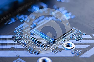Computer microchip on the system board. Silicon chip, hardware data processing