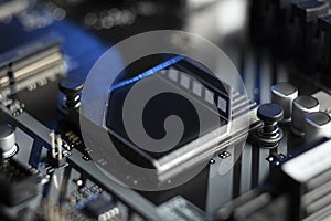 Computer microchip on the system board. Silicon chip, hardware data processing