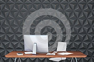 Computer in modern office interior with abstract blank gray wall