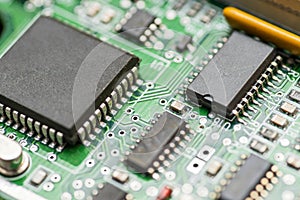 Computer motherboard. Chip close up on a integrated circuit. Electronic circuit board close up. Tech science background.