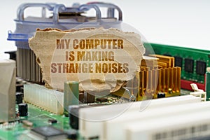 On the computer motherboard there is a cardboard with the inscription - My computer is making strange noises