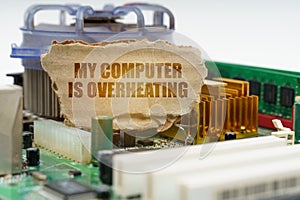 On the computer motherboard there is a cardboard with the inscription - My computer is overheating