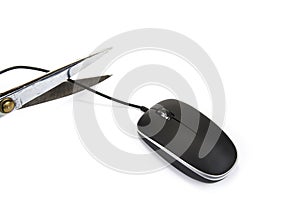 Computer mouse with black cable and scissors. Cut out or wireless connection.