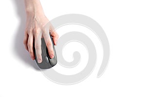 Computer mouse in the girl's hand. White background