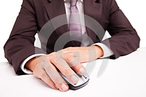Computer mouse in hand businessman on white