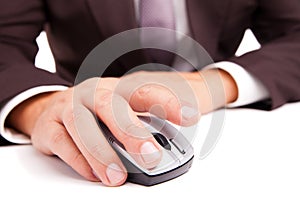 Computer mouse in hand businessman on white