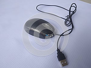 a computer mouse is a hand-held pointing device