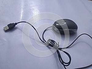 a computer mouse is a hand-held pointing device