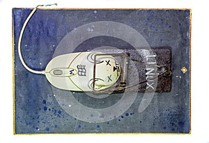 computer mouse is a man in a mousetrap. Humorous collage in the sphere of i t
