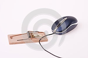 Computer mouse in mousetrap