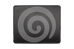 A computer mouse pad on a white background.Mouse pad made of thick black fabric