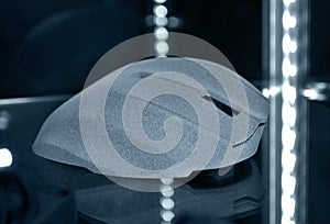 Computer mouse printed printed on 3d printer from powder close-up.