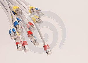 computer network cables over the grey background