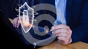 Computer network protection, secure and safe your data concept, businessman holding shield protection icon