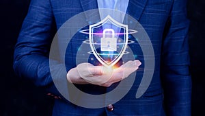Computer network protection, secure and safe your data concept, businessman holding shield protection icon