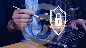Computer network protection, secure and safe your data concept, businessman holding shield protection icon,