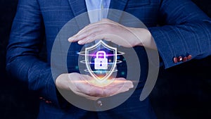 Computer network protection, secure and safe your data concept, businessman holding shield protection icon,