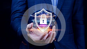 Computer network protection, secure and safe your data concept, businessman holding shield protection icon, Security shield Lock