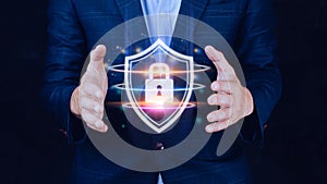 Computer network protection, secure and safe your data concept, businessman holding shield protection icon, Security shield Lock