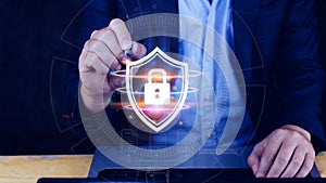 Computer network protection, secure and safe your data concept, businessman holding shield protection icon, Security shield Lock
