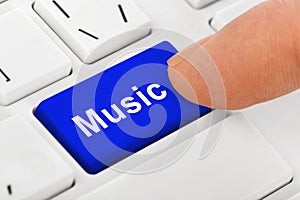 Computer notebook keyboard with Music key