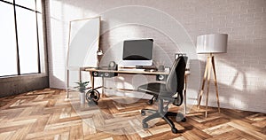 Computer and office tools on desk in room interior loft style with white brick wall on wooden floor.3D rendering