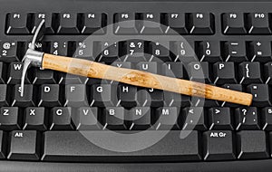 Computer and pickaxe - bitcoins mining