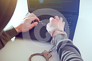Computer privacy attack. Hackers programmer look on screen and forcibly writes the program code hack information