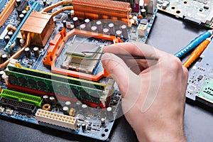 Computer processor chip disassembling close up