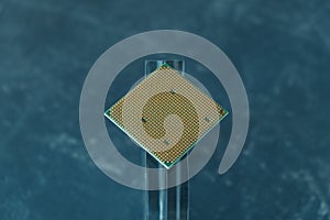 computer processor on a glass stand.