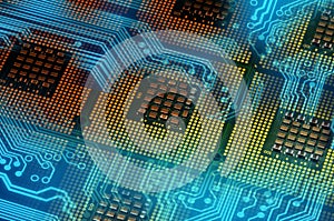 Computer processors and blue electronic circuit with lighting effects postproduction