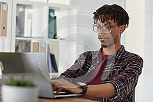 Computer Programmer Using Laptop