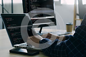 Computer programmer working on new software program.Coder recruited for solve all the script failures and renown the cyber safety