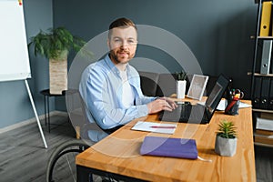 Computer Programmer Writing Program Code On Computer In Office.