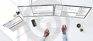 Software developer working in office