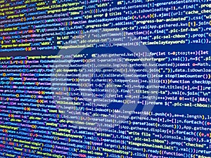 Computer programming coding screen source script of developer software at computing work. Modern web network and internet