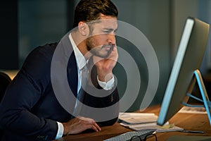 Computer, reading and Indian man in office, night and health of eyes, straining and vision for email. Overtime, stock photo