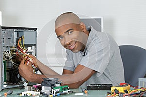 Computer repairman at work