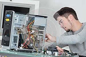 computer repairman at work