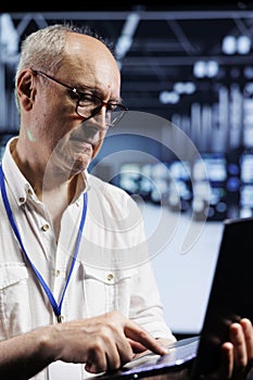 Computer scientist inspects servers